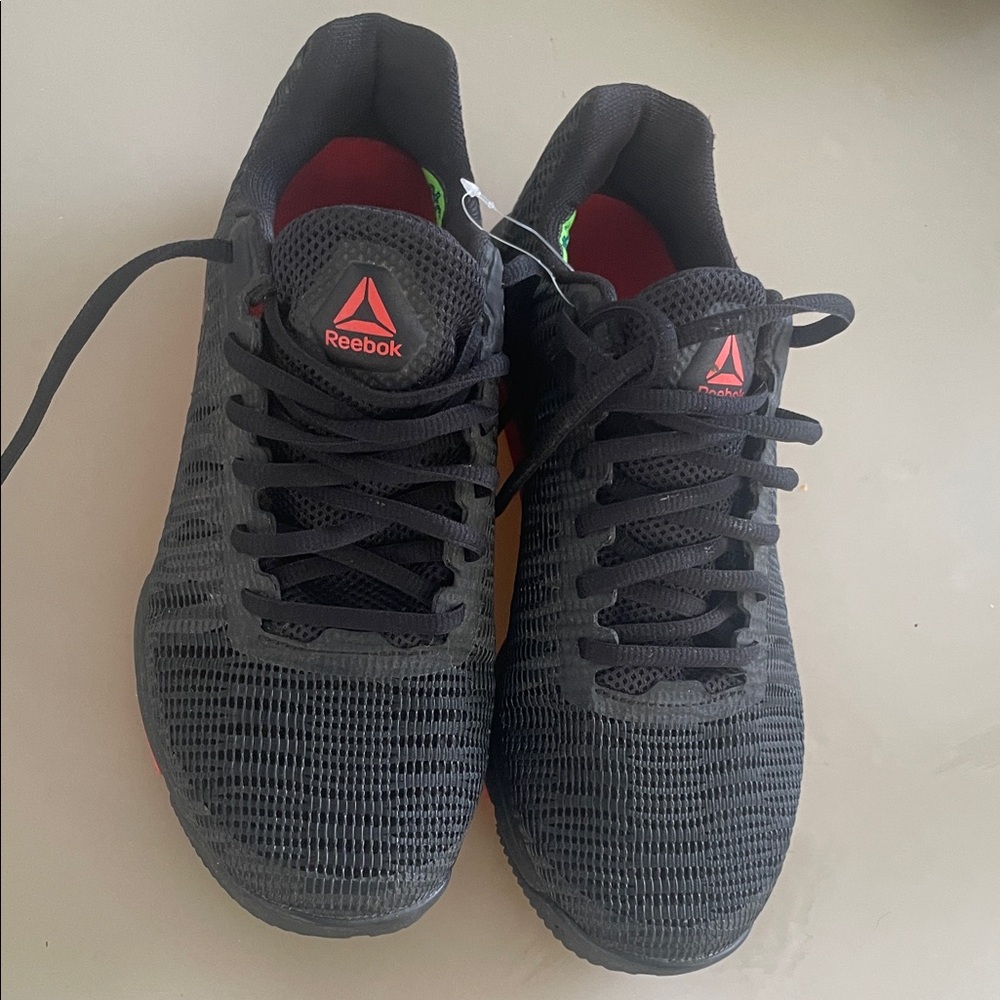 Reebok Black Athletic Running Shoes with Red Accents